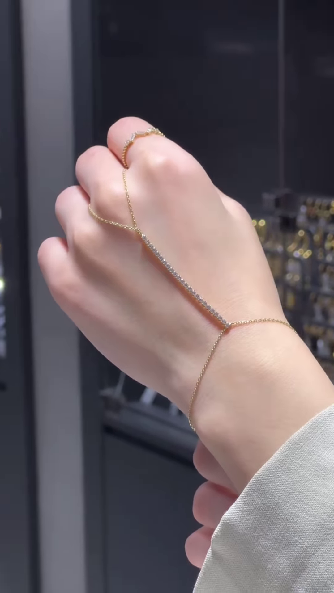 Delicate Gold-Plated Hand Chain Bracelet with Cubic Zirconia Bar - Adjustable Finger Ring Detail