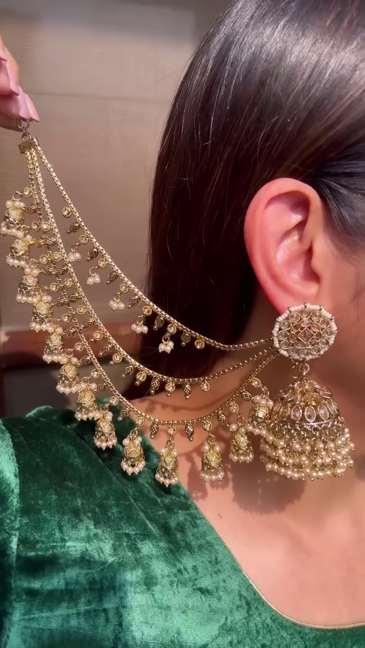 Ornate Gold-Toned Jhumka Earrings with Kundan and Multi-Chain Pearl Earchain