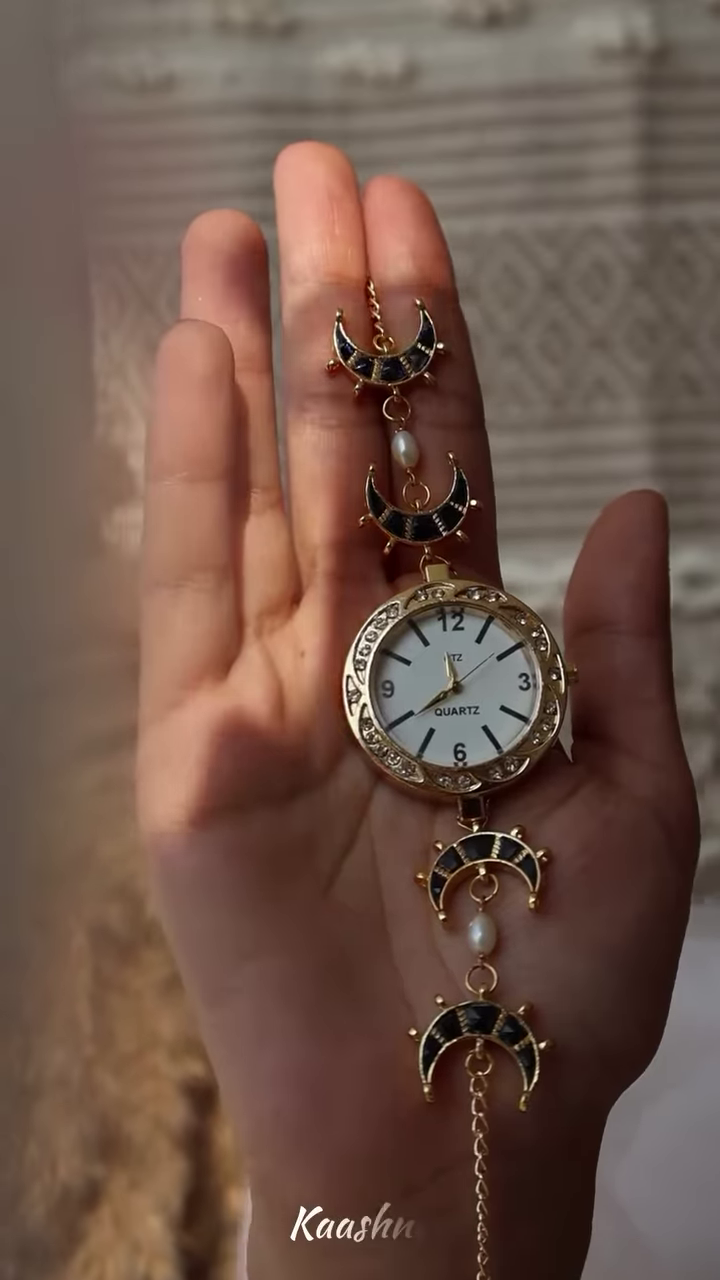 Whimsical Gold-Toned Wristwatch with Crescent Moon and Pearl Accents - Celestial Timepiece